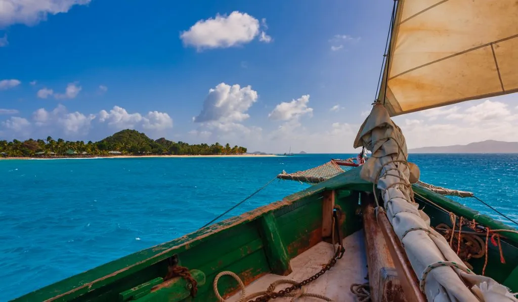 Pigeon Cay island clear water green boat