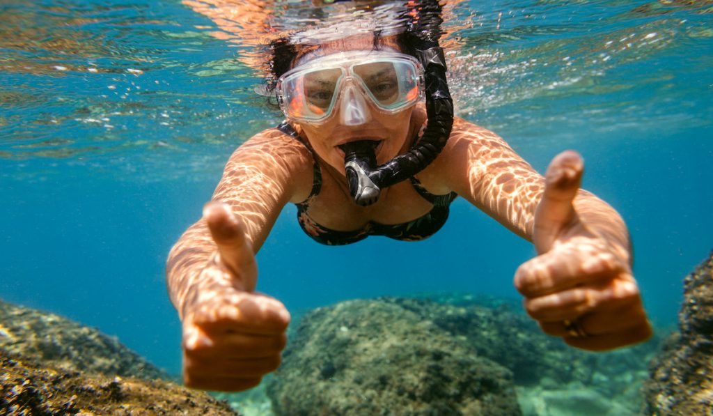 woman enjoying snorkeling 