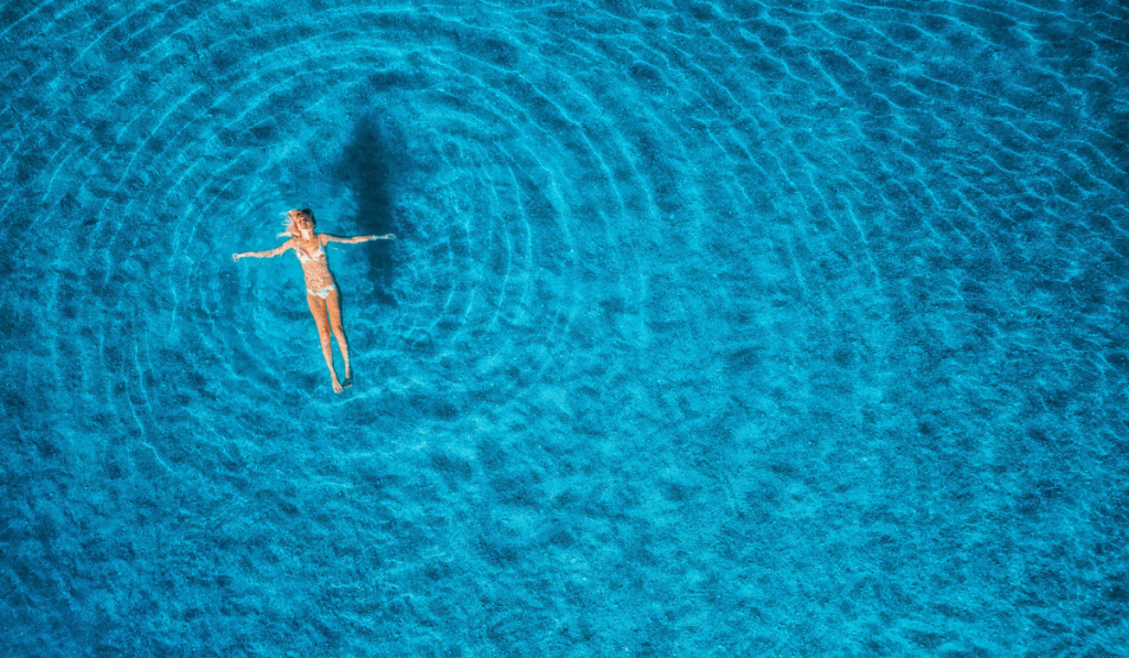 Aerial view of swimming woman in Mediterranean sea