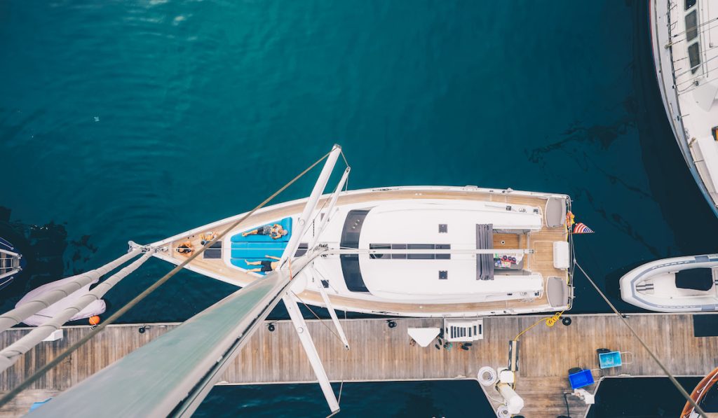 An overhead shot of a sailboat docked in San Diego bay